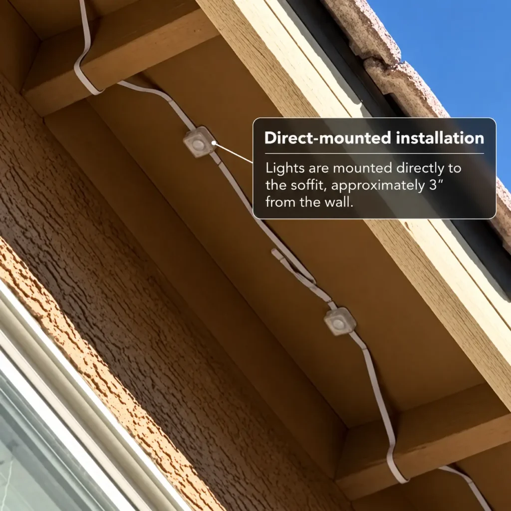 Govee permanent outdoor lights mounted directly to a wood soffit, with individual light housings and connecting wires visible.