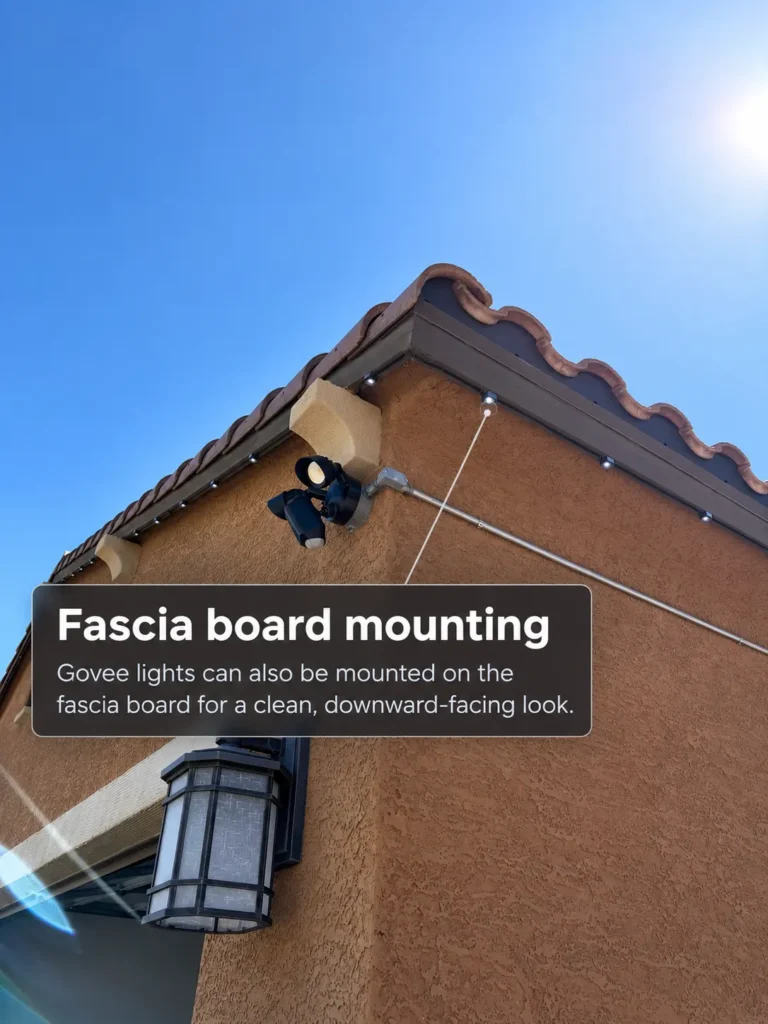 Govee permanent lights mounted along the fascia beneath a tile roof