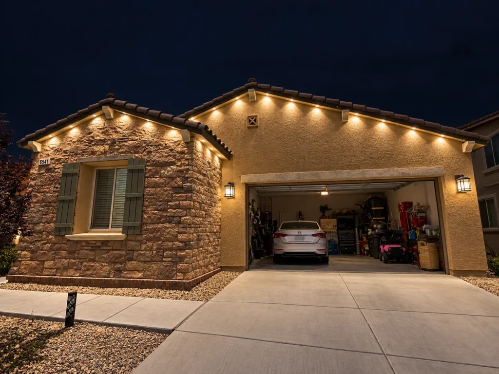 Warm-white permanent roofline lights on a Las Vegas home